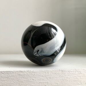handmade big shiny black & white glass marble
1.5 inches tall